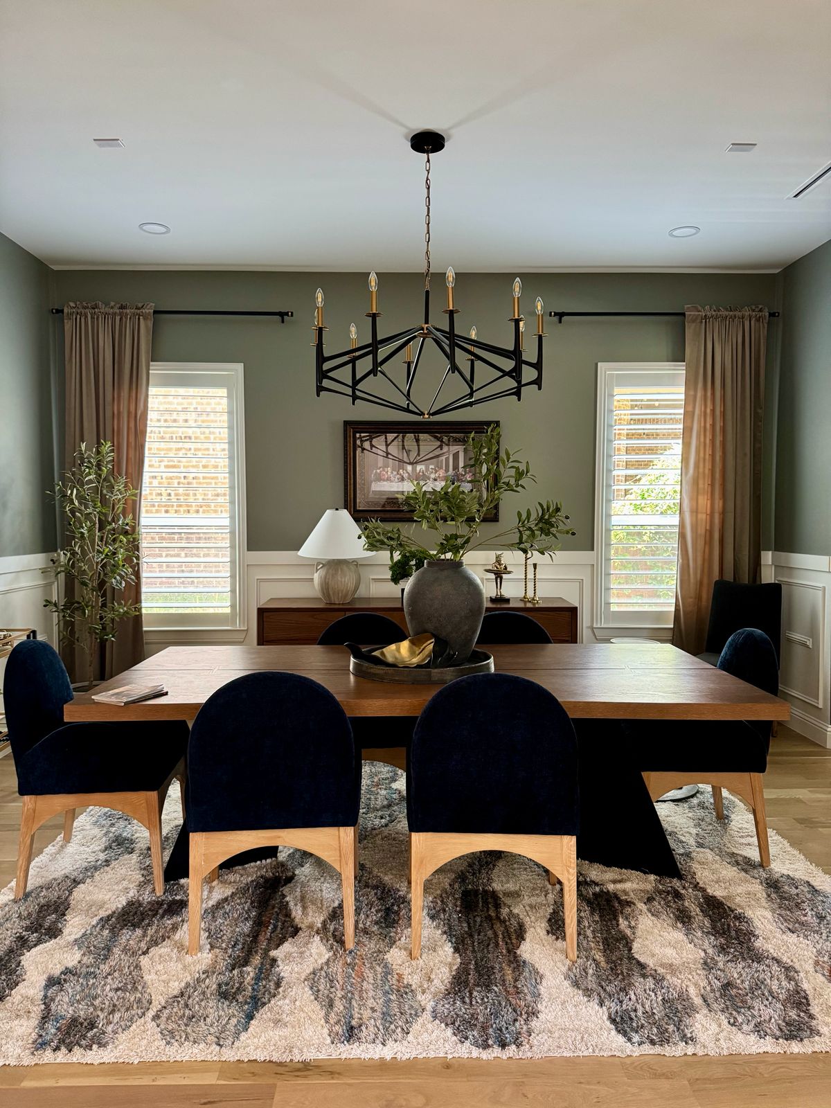 Elegant Dining Room with Green Walls