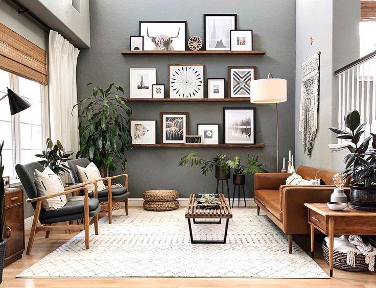 Modern living room interior design with leather sofa and floating shelves